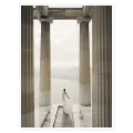 Woman in White Dress among Ancient Columns