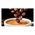 Freshly Roasted Coffee Beans Falling into Espresso Cup